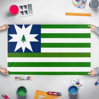 A mockup of the custom flag 'Vermont redesign  flag' held up on a table during print checking