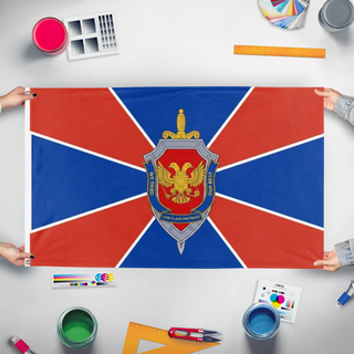 A mockup of the custom flag 'Low Class Spetsnaz flag' held up on a table during print checking