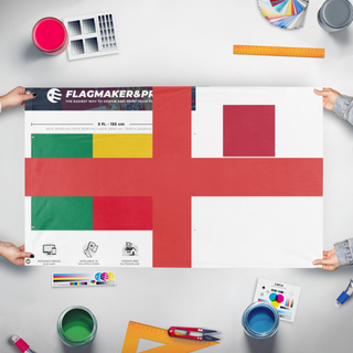 A mockup of the custom flag 'T flag' held up on a table during print checking