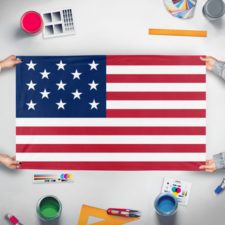 A mockup of the custom flag '13 Star USA flag' held up on a table during print checking