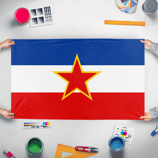 A mockup of the custom flag 'Yugoslavia  flag' held up on a table during print checking