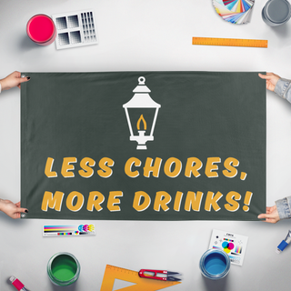 A mockup of the custom flag 'Less chores flag' held up on a table during print checking
