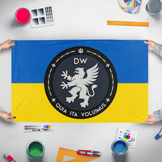 A mockup of the custom flag 'DW flag' held up on a table during print checking