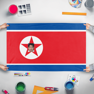 A mockup of the custom flag 'North Klocek Republic  flag' held up on a table during print checking