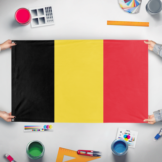 A mockup of the custom flag 'test flag' held up on a table during print checking