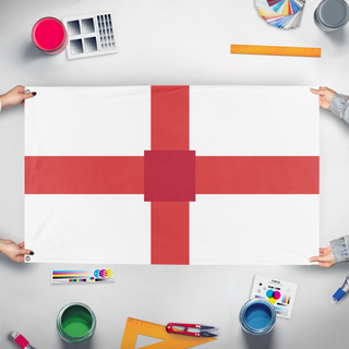 A mockup of the custom flag 'test flag' held up on a table during print checking