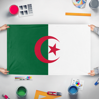 A mockup of the custom flag 'test flag' held up on a table during print checking