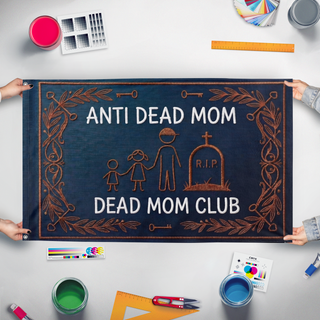 A mockup of the custom flag 'moms_dead flag' held up on a table during print checking
