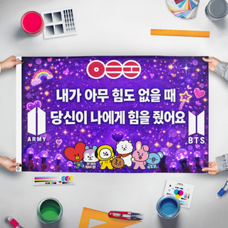 A mockup of the custom flag 'BTS  flag' held up on a table during print checking