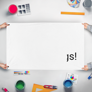 A mockup of the custom flag 'T flag' held up on a table during print checking
