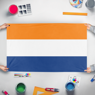 A mockup of the custom flag 'Prinsenvlag  flag' held up on a table during print checking