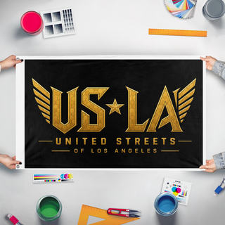 A mockup of the custom flag 'USofLA flag' held up on a table during print checking
