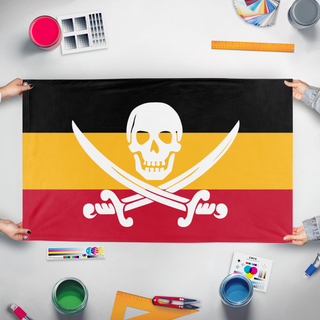 A mockup of the custom flag 'T flag' held up on a table during print checking