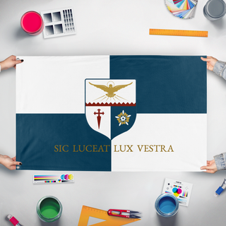A mockup of the custom flag 'ICA flag' held up on a table during print checking