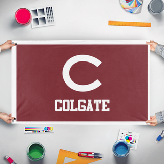 A mockup of the custom flag 'Colgate Flag' held up on a table during print checking