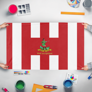A mockup of the custom flag 'Sons of Liberty Hanover Rifleman flag' held up on a table during print checking