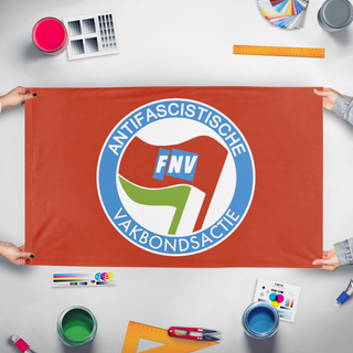 A mockup of the custom flag 'FNV-AFA' held up on a table during print checking