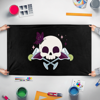 A mockup of the custom flag 'Sippin' Jolly Rodger flag' held up on a table during print checking