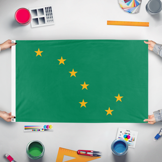 A mockup of the custom flag 'WCA flag' held up on a table during print checking