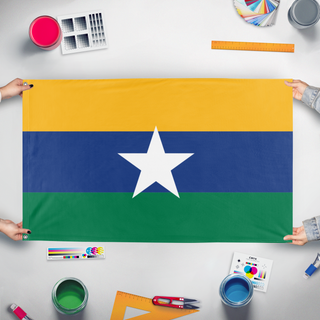 A mockup of the custom flag 'Republic of Slavistan flag' held up on a table during print checking