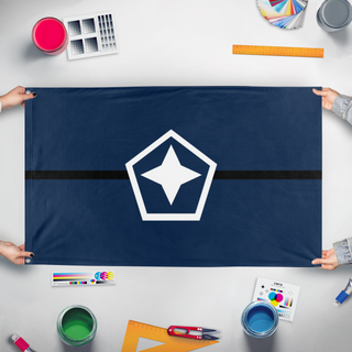 A mockup of the custom flag 'Astrion Federation flag' held up on a table during print checking