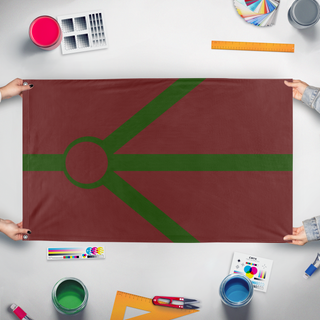 A mockup of the custom flag 'V flag' held up on a table during print checking