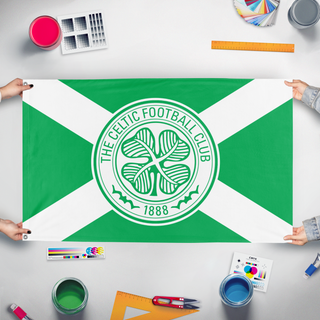 A mockup of the custom flag 'celtic saltire flag' held up on a table during print checking
