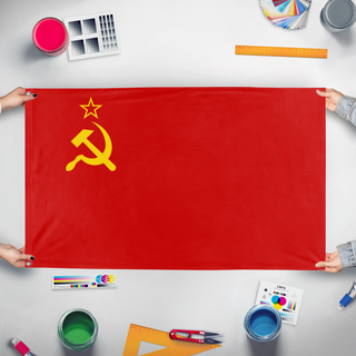A mockup of the custom flag 'USSR' held up on a table during print checking