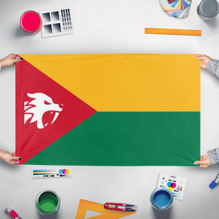 A mockup of the custom flag 'Manguesh  flag' held up on a table during print checking