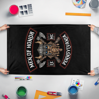A mockup of the custom flag 'Men of Honor Vertical flag' held up on a table during print checking