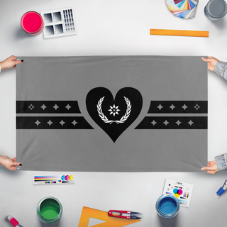 A mockup of the custom flag 'Ashen Flag of New Pangea' held up on a table during print checking