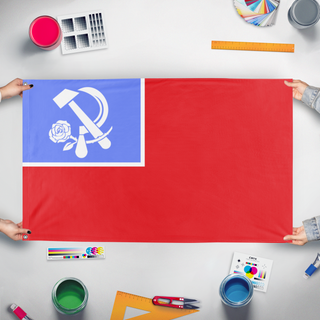 A mockup of the custom flag 'Kautskyist America flag' held up on a table during print checking