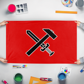 A mockup of the custom flag 'strasserism flag' held up on a table during print checking