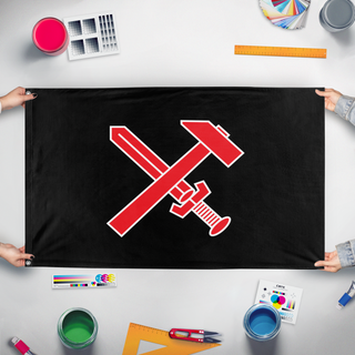 A mockup of the custom flag 'strasserism original  flag' held up on a table during print checking