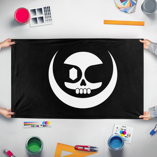 A mockup of the custom flag 'Les Ratons Laveurs flag' held up on a table during print checking