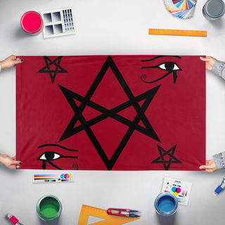 A mockup of the custom flag 'satanic flag' held up on a table during print checking