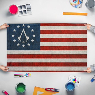 A mockup of the custom flag 'AC3merica flag' held up on a table during print checking