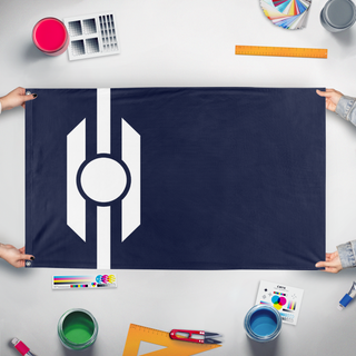A mockup of the custom flag 'SolCommonwealth flag' held up on a table during print checking