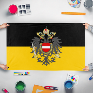 A mockup of the custom flag 'Austrian empire flag' held up on a table during print checking