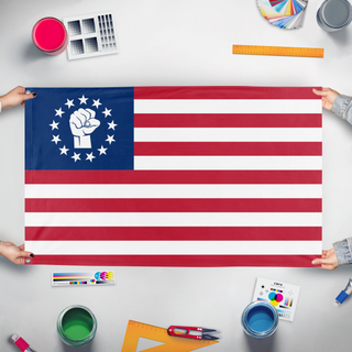 A mockup of the custom flag 'Leftist Betsy Ross flag' held up on a table during print checking