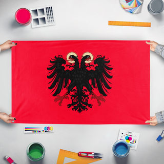 A mockup of the custom flag 'Kingdom of Albania' held up on a table during print checking