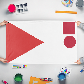 A mockup of the custom flag 'TEST flag' held up on a table during print checking