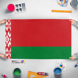 A mockup of the custom flag 'T flag' held up on a table during print checking