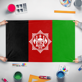 A mockup of the custom flag '1929 Afghanistan flag' held up on a table during print checking