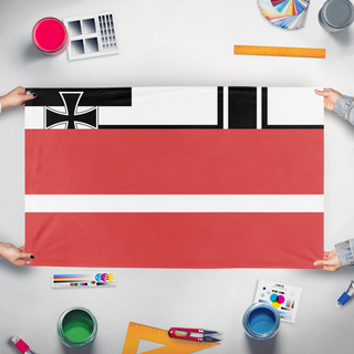 A mockup of the custom flag 'T flag' held up on a table during print checking