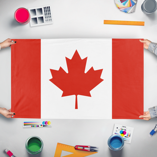 A mockup of the custom flag 'T flag' held up on a table during print checking