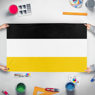 A mockup of the custom flag 'Union of Upper SIlesian flag' held up on a table during print checking