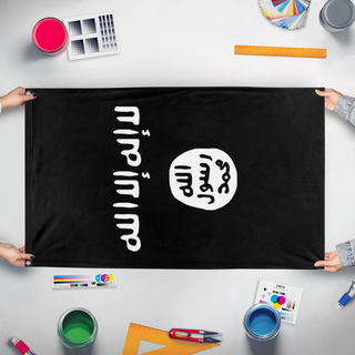 A mockup of the custom flag 'Shahada flag' held up on a table during print checking