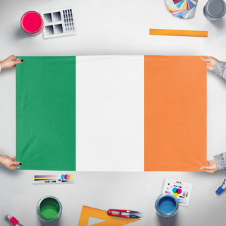 A mockup of the custom flag 'Ireland flag' held up on a table during print checking