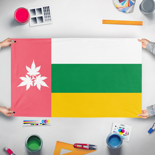 A mockup of the custom flag 'Florestia flag' held up on a table during print checking